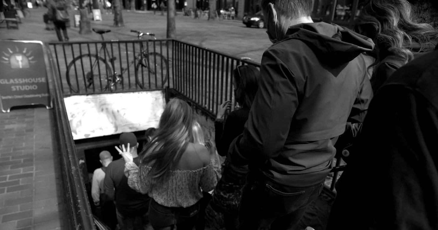 a group of people sitting on a bench
