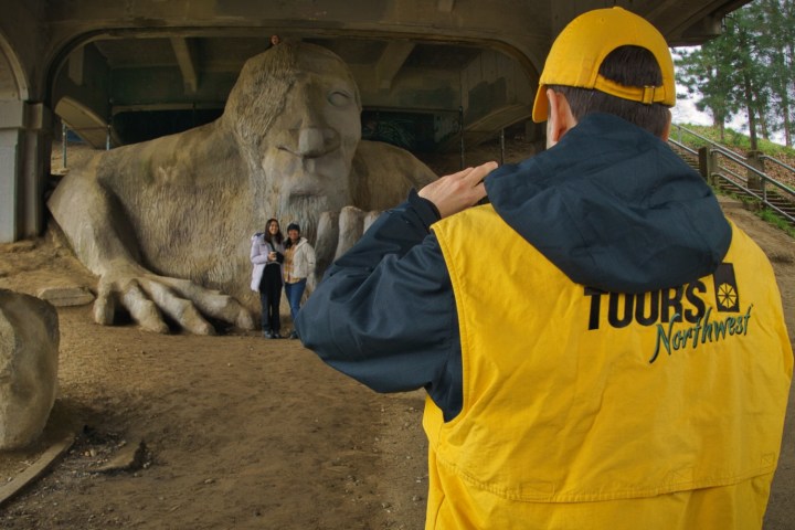 a man holding an animal