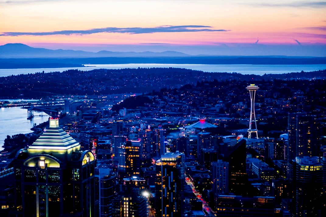 Seattle Skyline View at sunset with Space Needle and water in the background